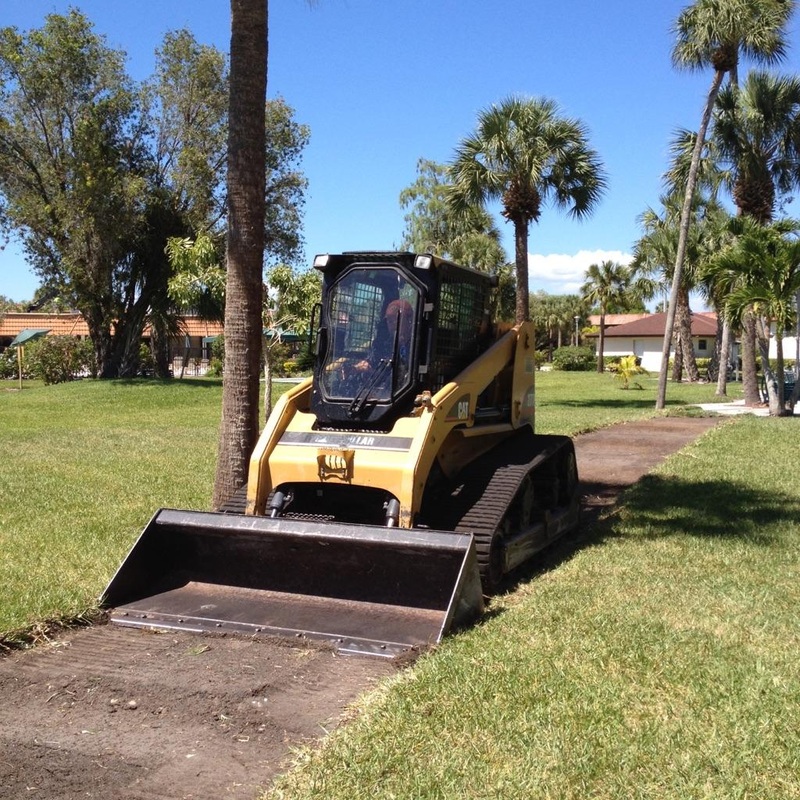 Skid steer on community job